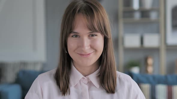 Young Girl Shaking Head to Accept Yes alt