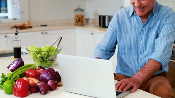 Loving kids and mother are giving present to their father in living room alt