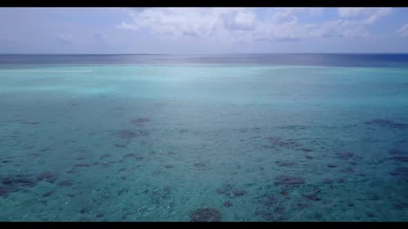 Aerial drone tourism of perfect lagoon beach wildlife by blue green lagoon with bright sand backgrou alt