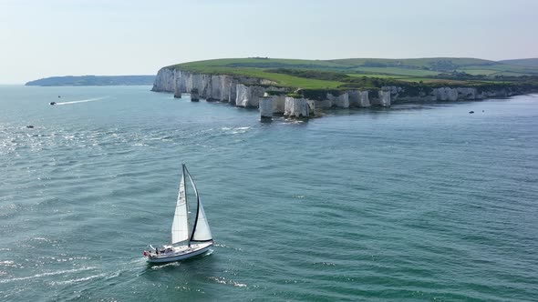 A Sailing Ship at Old Harry Rocks in the UK alt