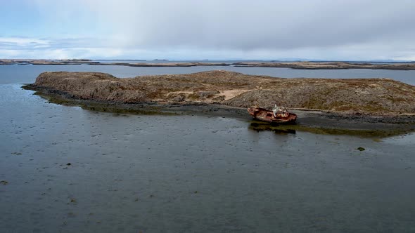 Small Uninhabited Island In Iceland with Rusty Abandoned Shipwreck alt