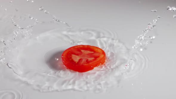 Slice of Tomato and Splashing Water