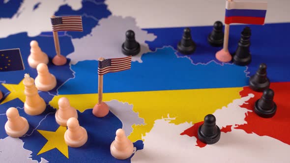 EU USA and Russian Flags with Chess Pieces Symbolizing the Conflict and Control of Ukraine