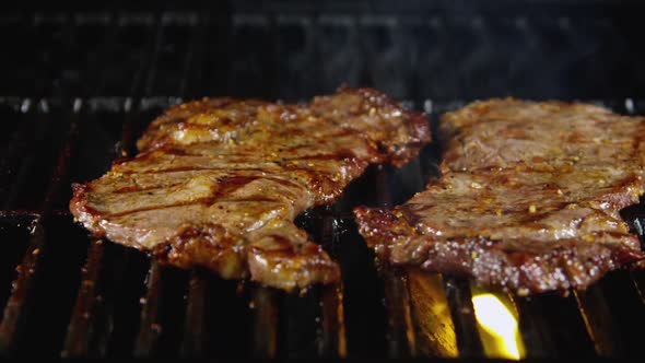 Beef Steaks On Hot Barbecue Grill 06