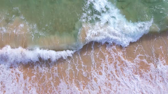 Beautiful waves Foaming and Splashing on the beach sand. Ocean sea. Beautiful waves in open sea alt