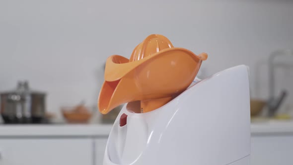 Mincer Machine with Citrus Juicer in Kitchen. White Electric Mincer Machines for Minced Meat Per alt