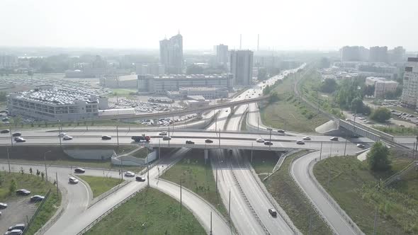 Automobile road interchange with traffic in the daytime alt