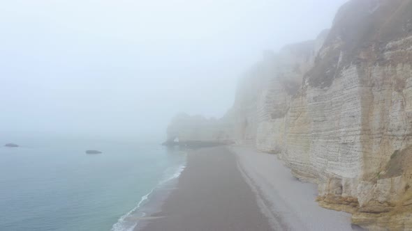 rocky cliffs and the sea at the Etretat, Normandy.  alt