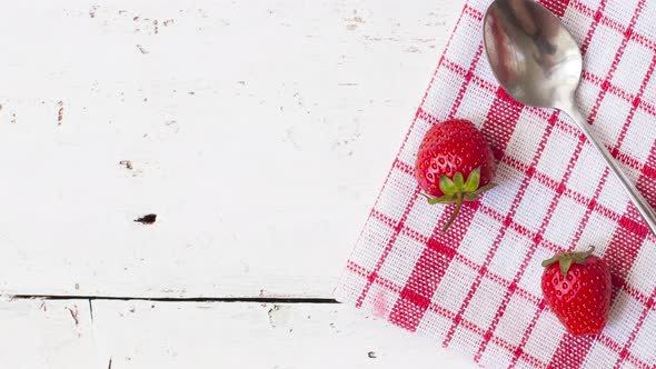 Top View on White Table with Red Fresh Strawberries