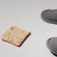 Peanut butter toast falls down on a floor near a slippers. - VideoHive Item for Sale