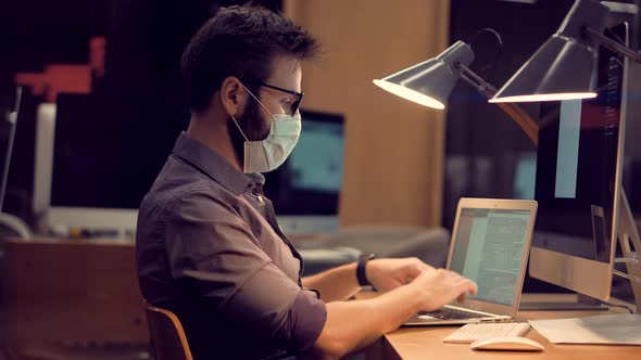 Man In Face Mask Office Workplace On Coronavirus Covid Epidemic. Remote Chatting Colleague Internet alt