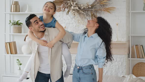 Multiethnic Multiracial Family Young Parents Caring Spaniard Father Husband Holding Piggyback alt