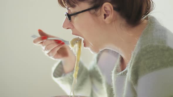 Woman Eating Noodles on Stools Economic Crisis Cheap Food Economic Depression