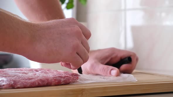 Man Signs Marker Date of Production Gram Minced Pork Beef Laid Out in Bags for Storage in Freezer