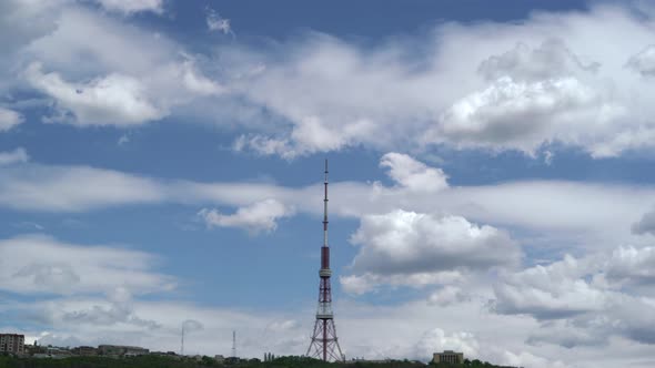 Time Lapse of Iron Communication Tower with Fast Moving Clouds