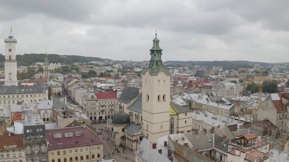 Aerial Drone Video Panorama of Latin Cathedral in City Lviv Ukraine Flight Above Roofs Streets alt