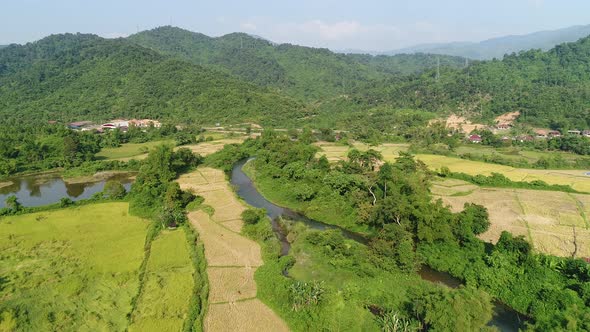 Natural landscapes around the city of Vang Vieng in Laos seen from the sky alt