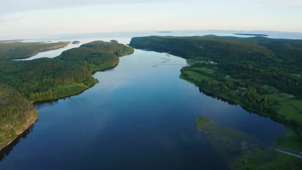 Aerial View of Clear Water Lake and Green Forest by Ladoga Lake in Karelia, Russia