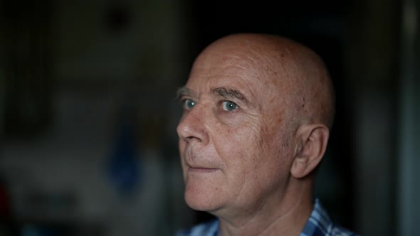 Portrait of Senior Man in Apartment Closeup of Face Aged Person Indoors Wrinkles and Age Spots alt
