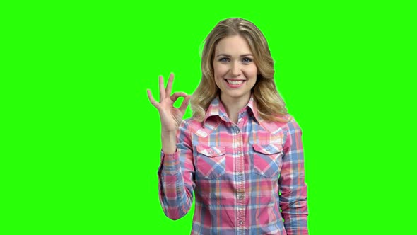 Pretty Caucasian Girl Showing OK Sign alt