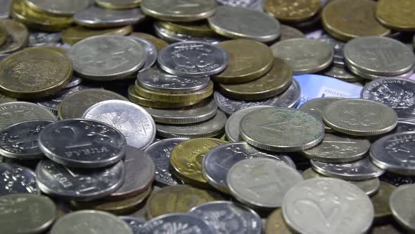 A Lot of Coins and Cents Rubles. Throwing Coins Into a Common Heap. Russian Rubles. alt