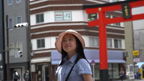 Beautiful Asian Girl Walking In The City On Summer Day,Ueno Tokyo Slow Motion alt