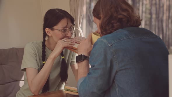 Couple Chatting during Lunch in House on Wheels alt