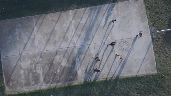 Aerial View of People Seen Playing Basketball on Outdoor Court