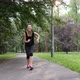 4K steady footage of a young girl jogging in the park - VideoHive Item for Sale