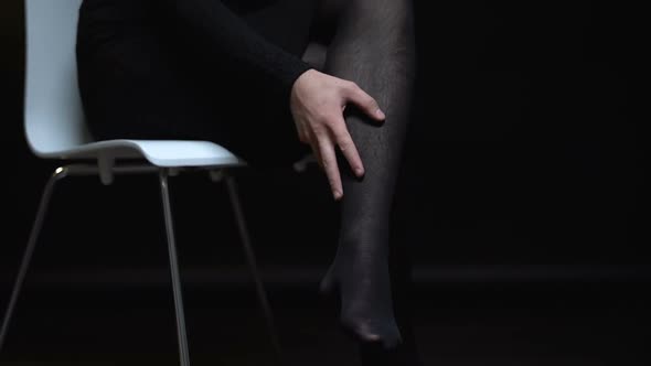 Bigender Person in Female Clothes Applying Lipstick, Trans Beauty Care Concept alt