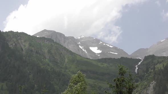 Beautiful Scenery Of The Snow-Covered Mountain Range On The Rural Area Of Austria. wide shot alt