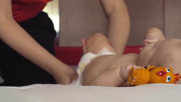 Baby Girl Learning How To Roll Over alt