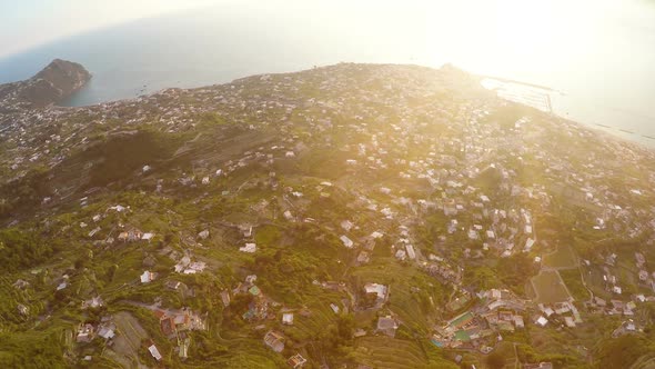 Amazing Landscape on Volcanic Island With Many Houses on Green Hills, Magic Hour alt