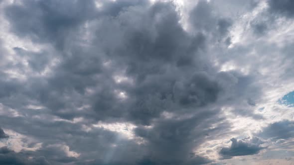 Timelapse of Gray Cumulus Clouds Moves in Blue Dramatic Sky Cirrus Cloud Space alt