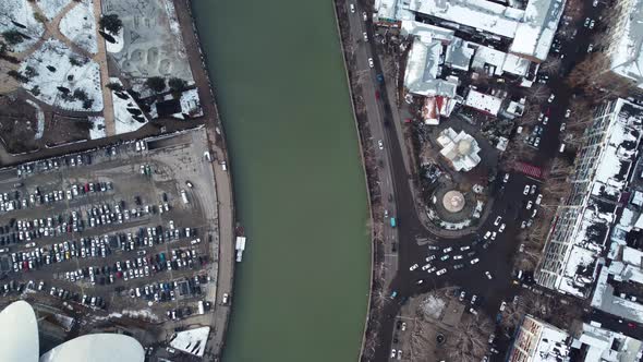 Traffic By The River In The Snowy City alt