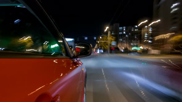 Drivelapse From Side of Car Moving on a Night Avenue in City Timelapse Hyperlapse alt