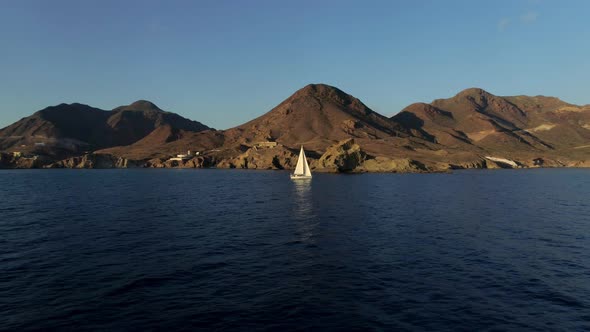 Sailboat with Spain Landscape on the Background alt