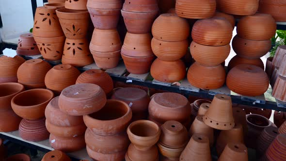 Floral Clay Brown Pots of Various Shapes and Sizes Sell in Flower Shop alt