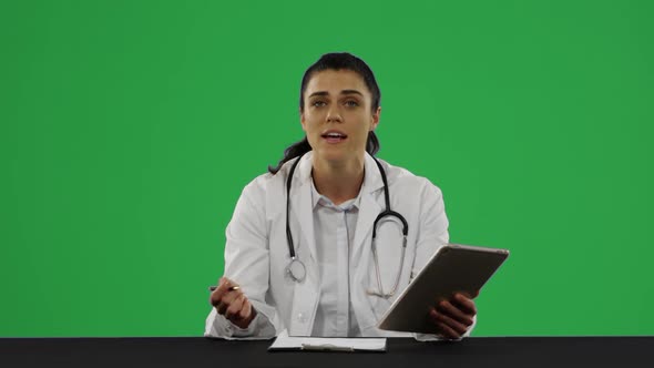 Young doctor in a lab coat alt