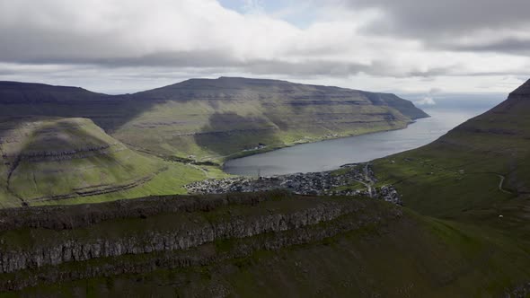 Drone Arcing Over Summit Of Klakkur Mountain alt