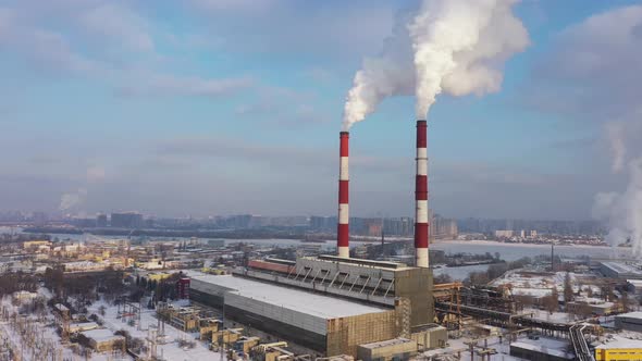 Garbage Incineration Plant. Environmental Pollution Within the City at the Wintertime alt