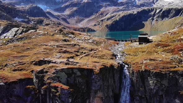 Picturesque View Of Waterfall Flowing From Lake Weisee In Austria - wide shot alt