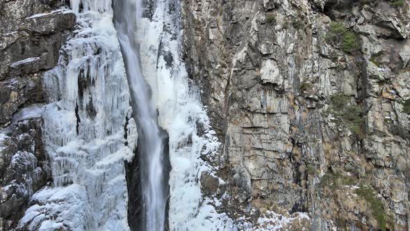 Waterfall Surrounded By Rocks