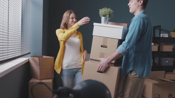 Happy young couple moving in their new home