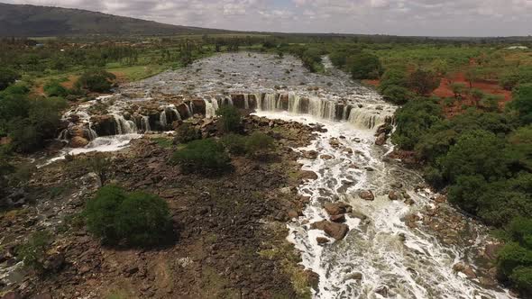Aerial shot of Fourteen Falls and Athi river, Kenya  alt