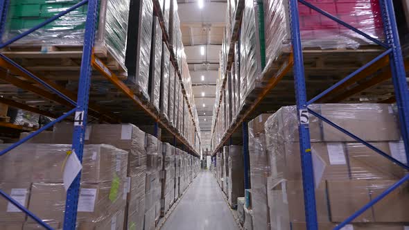 Warehouse with Packed Goods on Racks alt