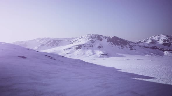 Snowed Mountains in Alaska with Fog alt