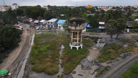 Aerial view of an old water tank in disuse in Battambang, Cambodia. alt