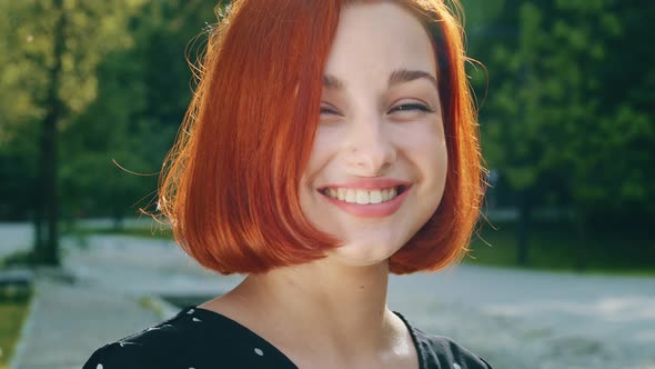 Excited Caucasian Creative Young Student Girl Redhead Woman Makes Gesture Raises Finger Come Up with alt