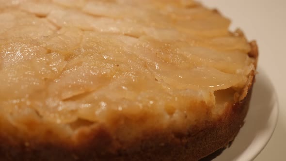 Slow tilt over   baked tasty  fruit cake  4K 2160p 30fps UltraHD footage - Apple pie in baking tray  alt